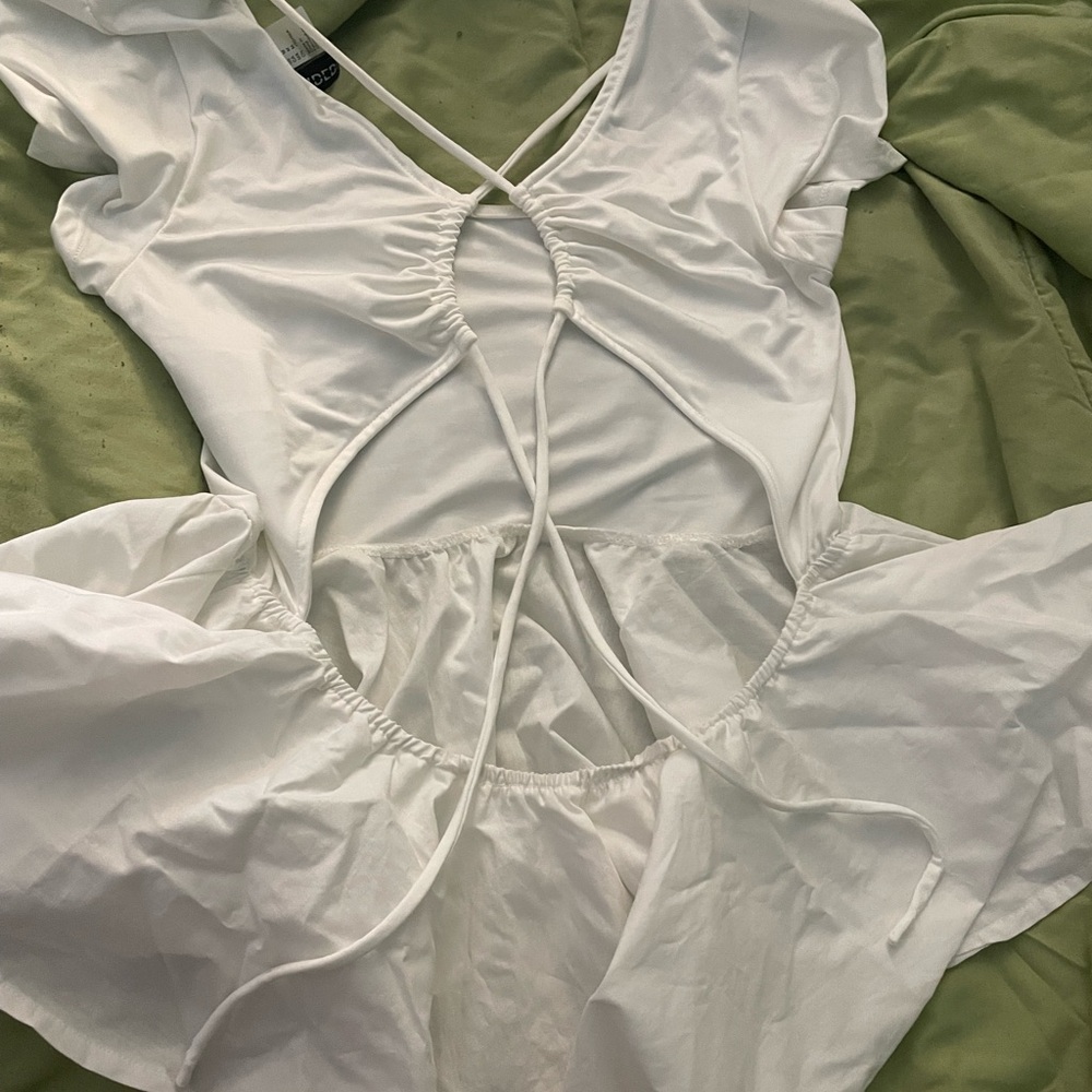 White Crisscross Peplum Top